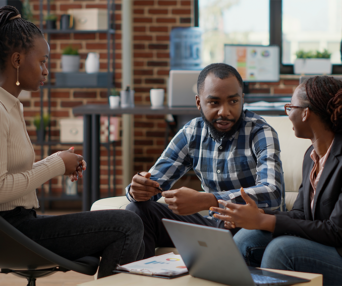 sitting-employees-discussing-project